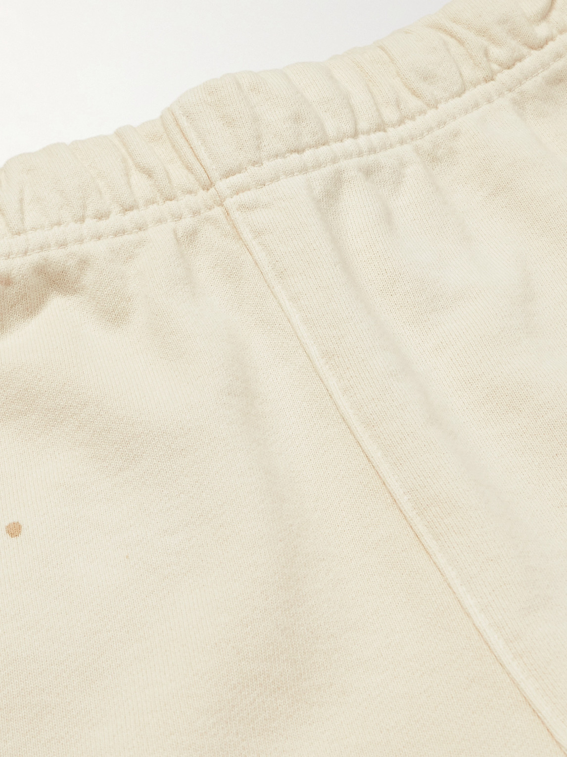 Shop Gallery Dept. Tapered Logo-print Paint-splattered Cotton-jersey Sweatpants In Neutrals
