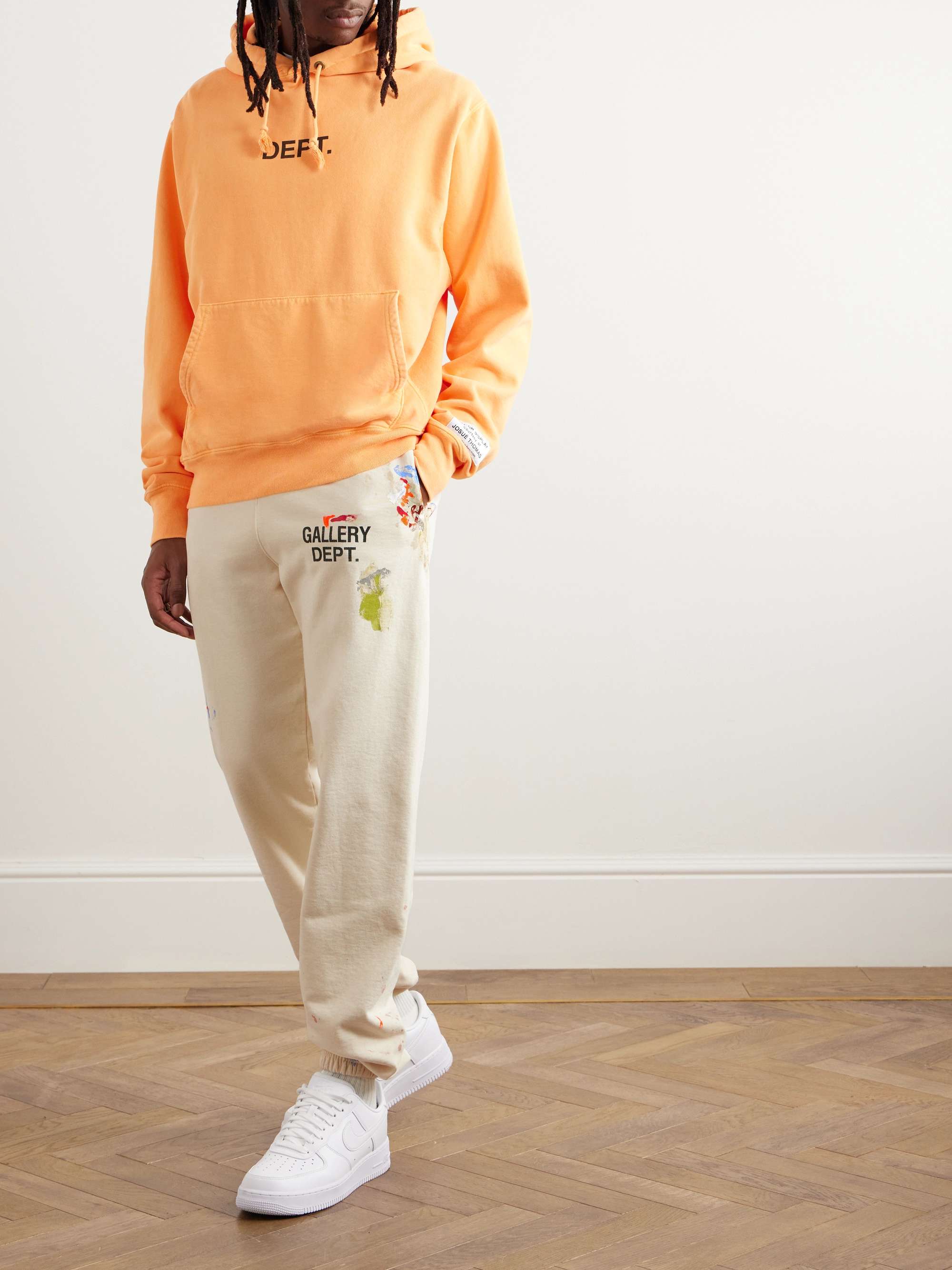 Tapered Logo-Print Paint-Splattered Cotton-Jersey Sweatpants