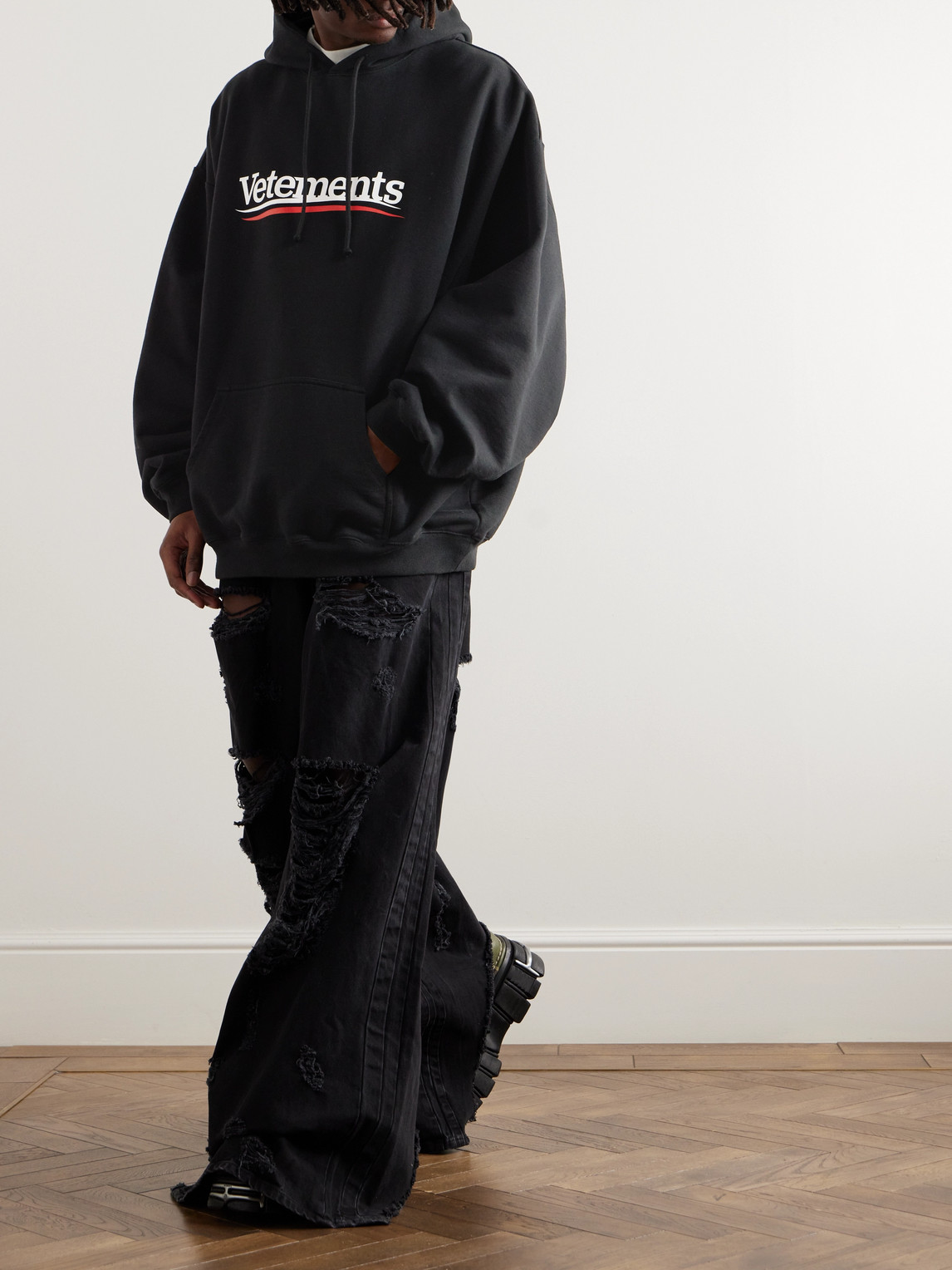 Shop Vetements Oversized Logo-print Cotton-blend Jersey Hoodie In Black