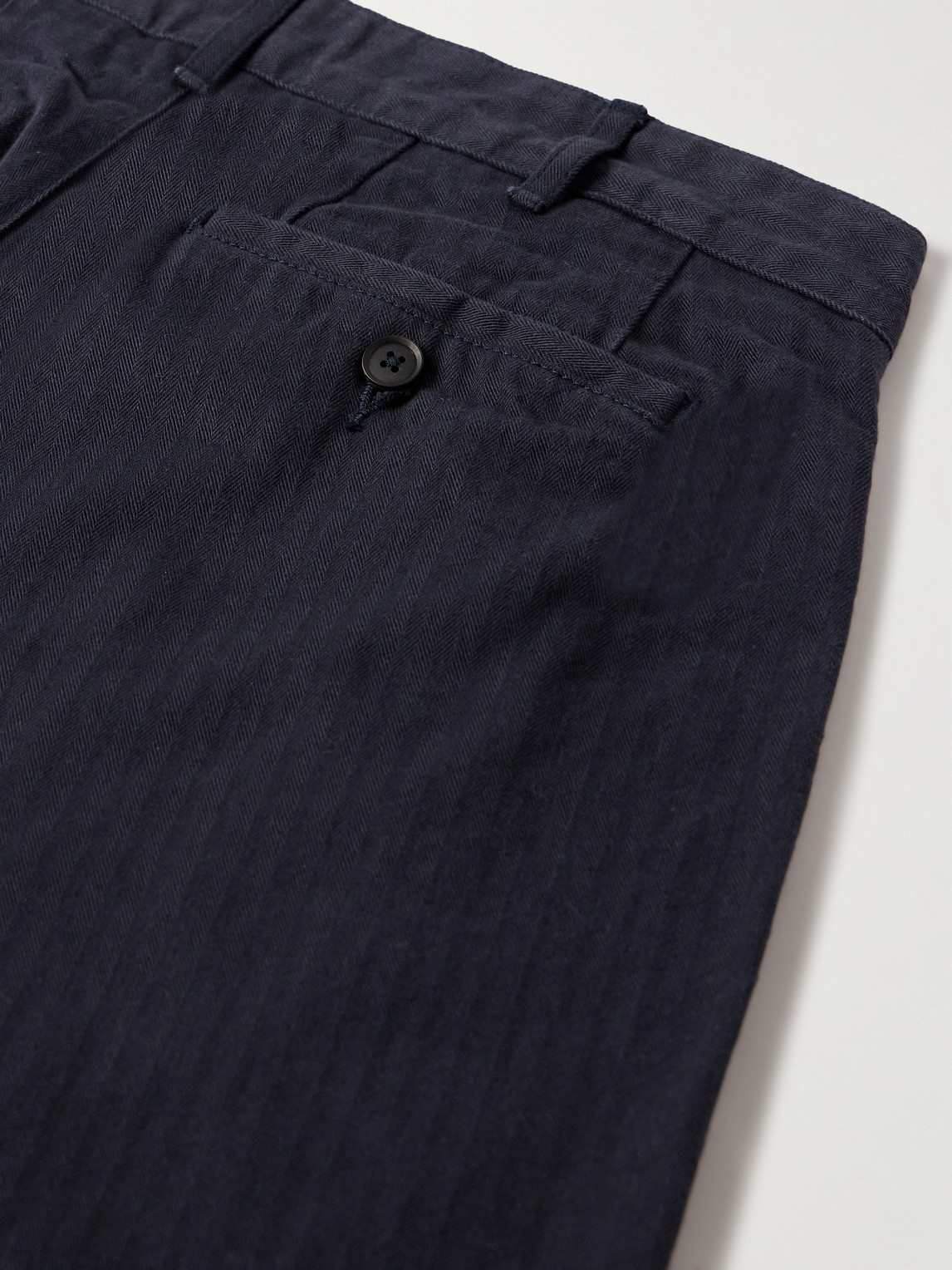 Noah Straight-leg Pleated Herringbone Cotton Trousers In Blue