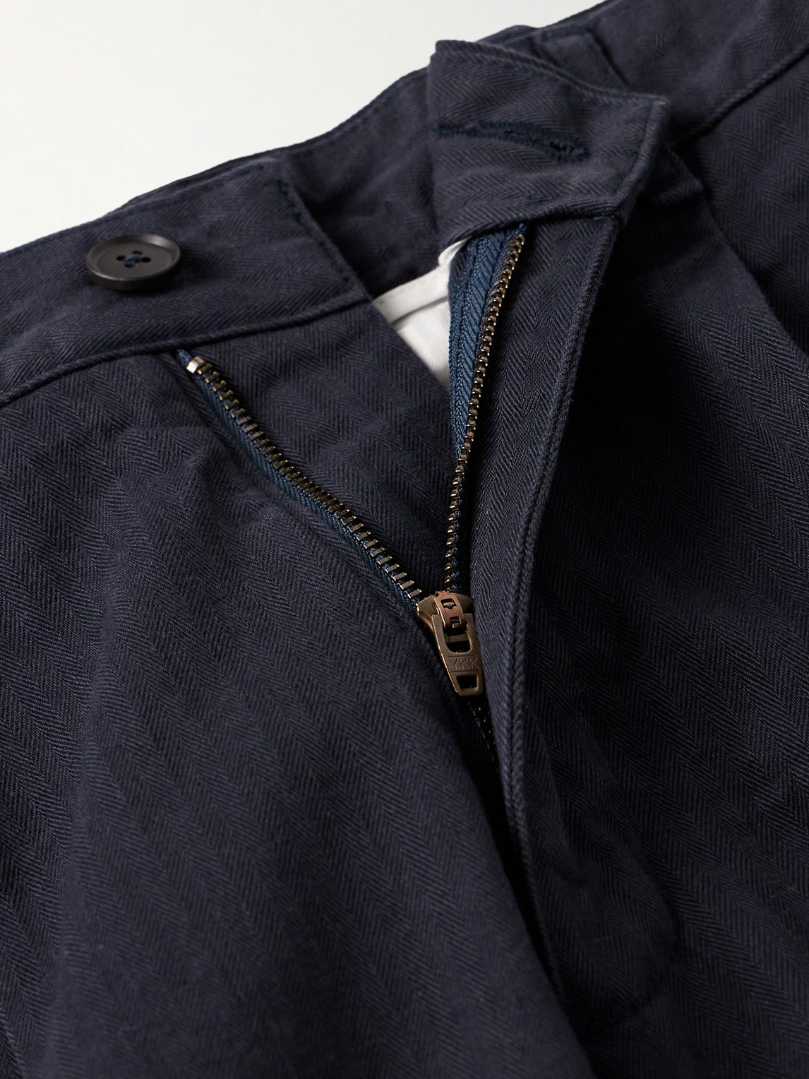 Noah Straight-leg Pleated Herringbone Cotton Trousers In Blue