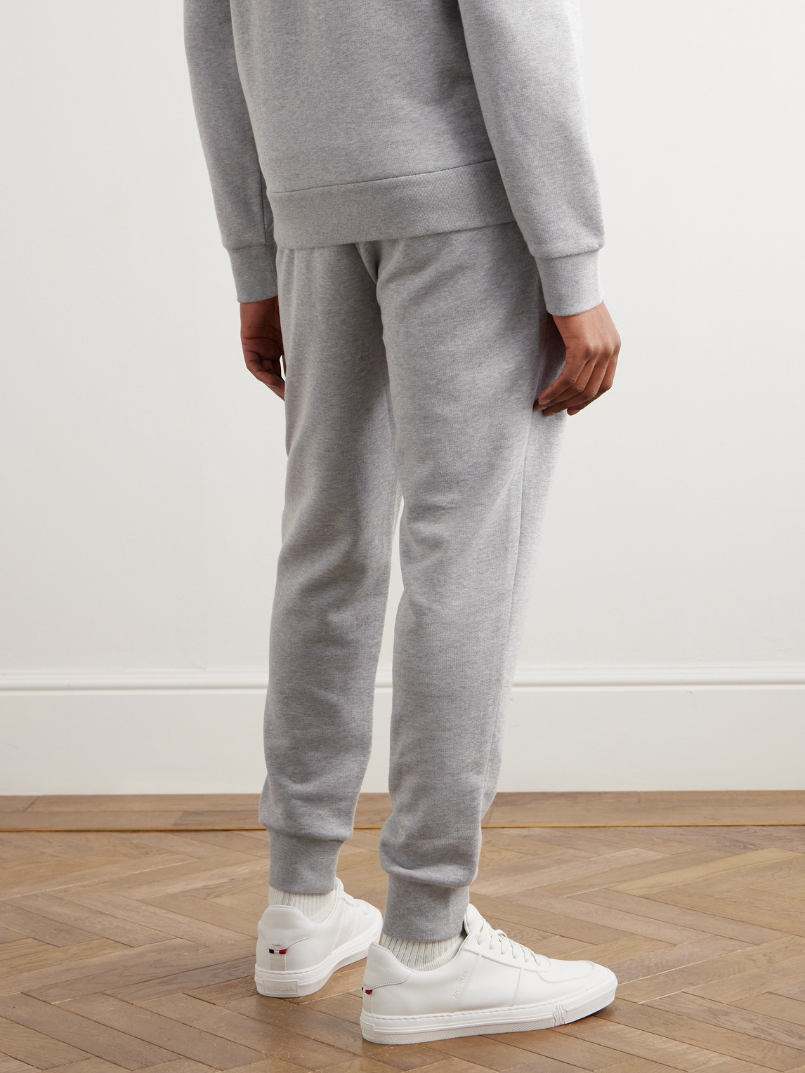 Shop Moncler Logo-appliquéd Cotton-jersey Sweatpants In Gray