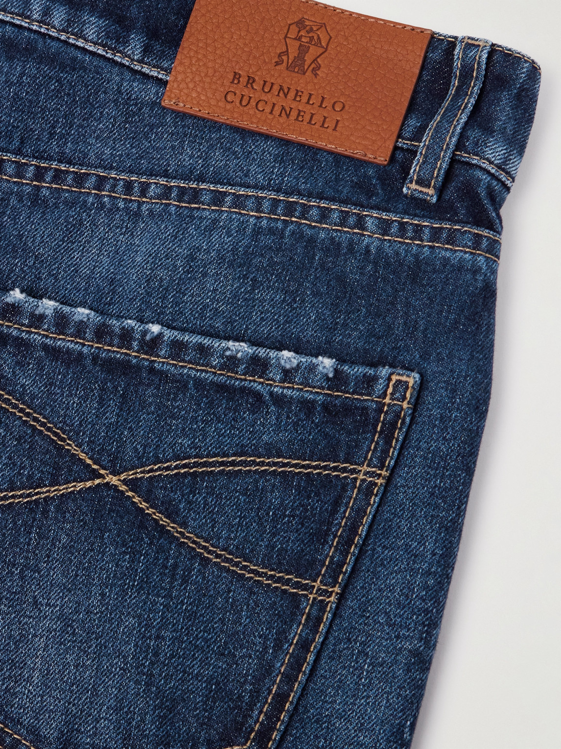 Shop Brunello Cucinelli Slim-fit Tapered Logo-embroidered Distressed Jeans In Blue