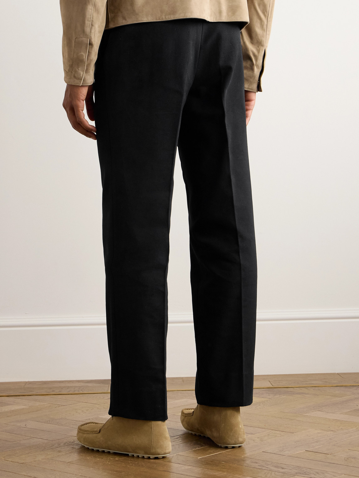 Shop Stòffa Tapered Pleated Cotton-canvas Trousers In Black