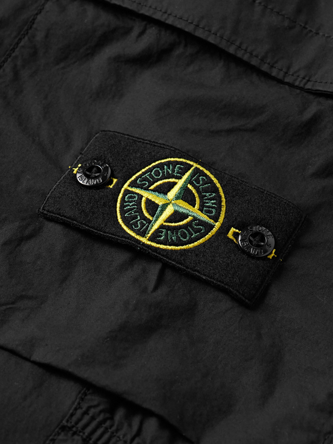 Stone Island Logo Patch Cargo Trousers In Black