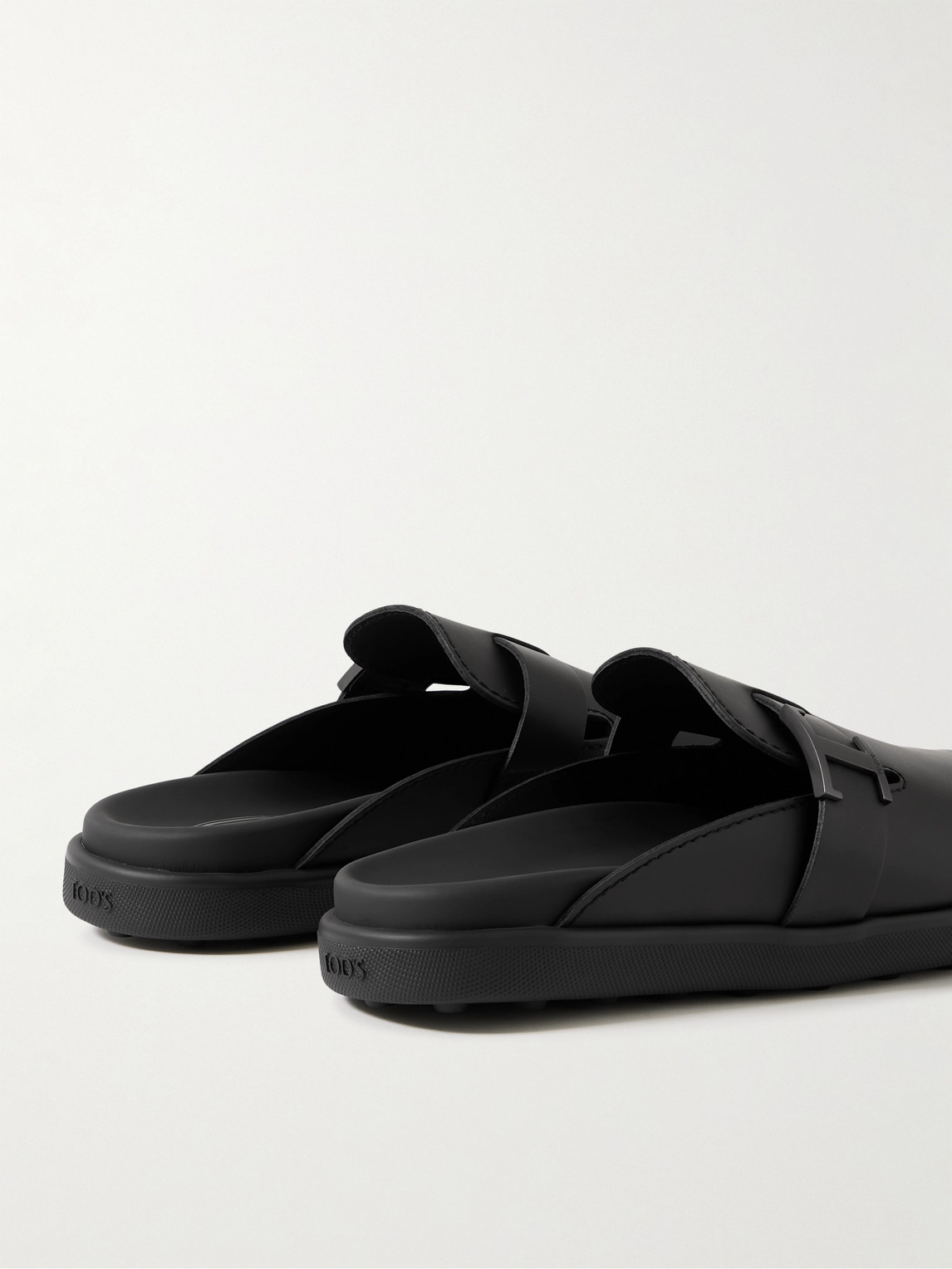 Shop Tod's Leather Clogs In Black