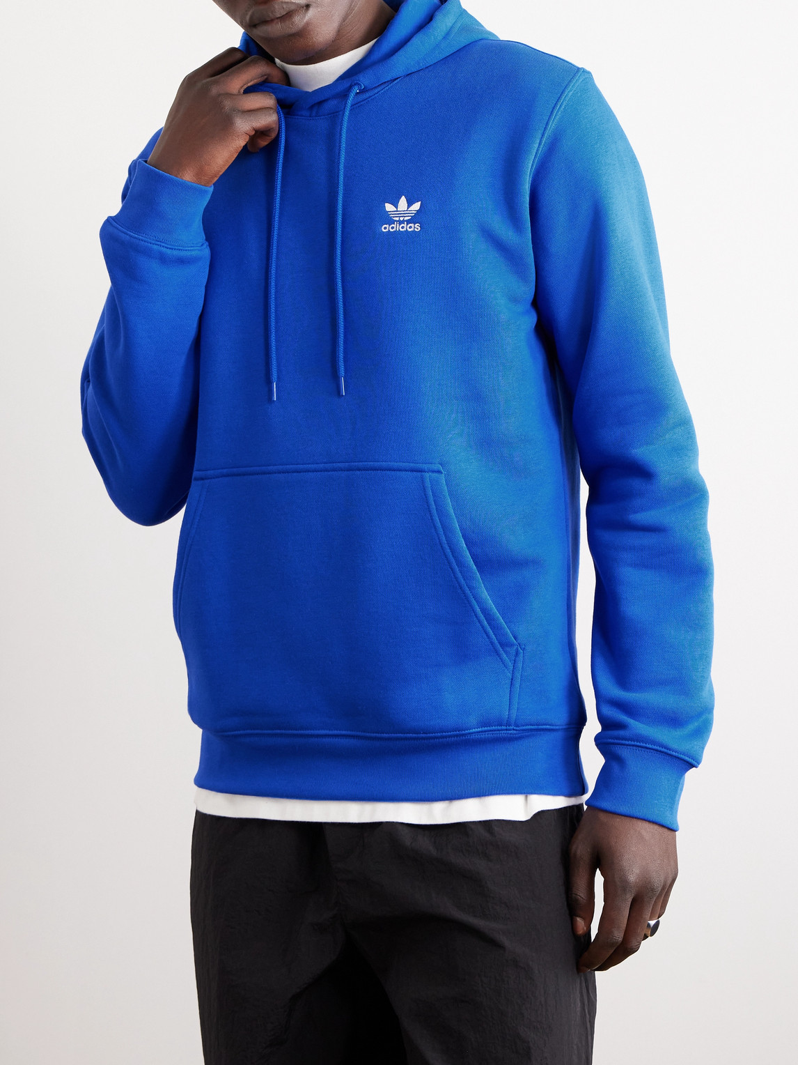 Shop Adidas Originals Essential Logo-embroidered Cotton-blend Jersey Hoodie In Blue