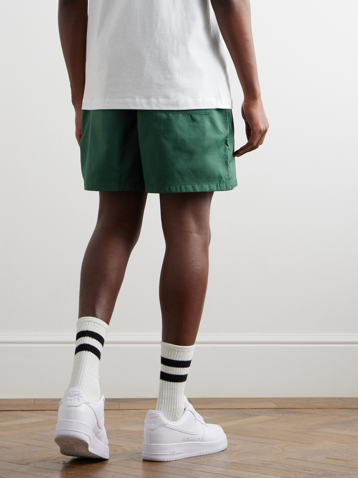 Shop Nike Club Flow Straight-leg Shell Shorts In Green