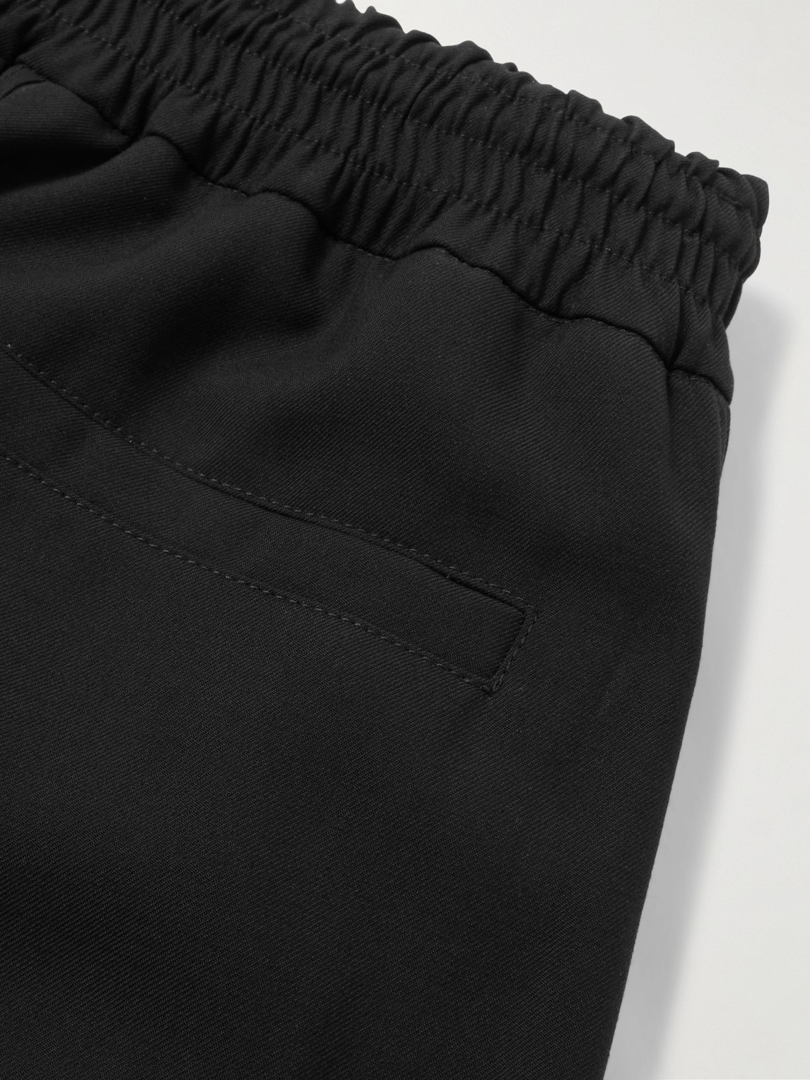 Shop Alexander Mcqueen Tapered Wool-gabardine Trousers In Black