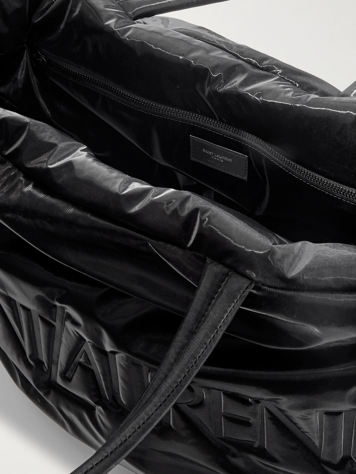 Shop Saint Laurent Logo-debossed Glossed-shell Tote Bag In Black
