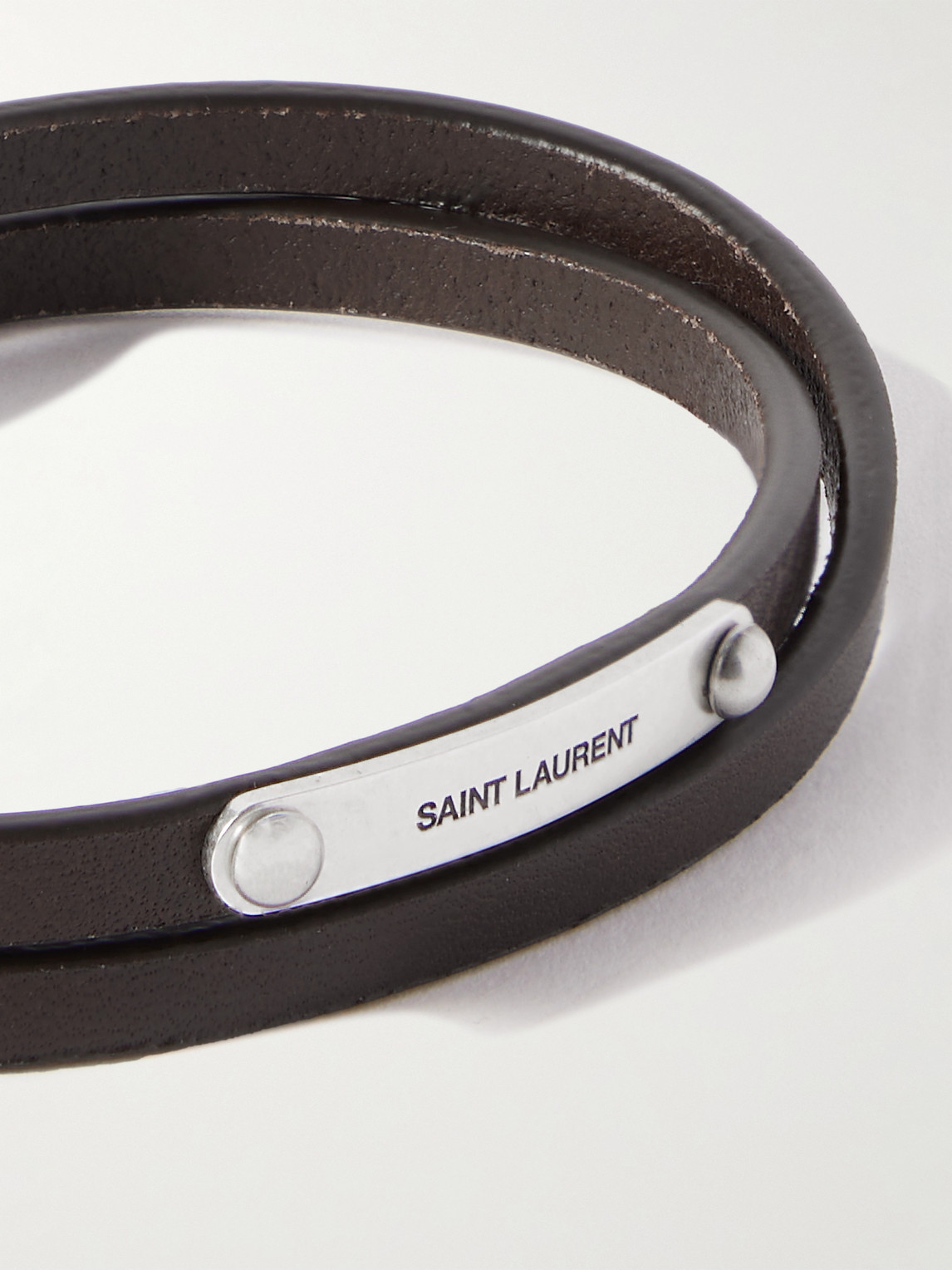 Shop Saint Laurent Cassandre Silver-tone And Leather Bracelet In Black
