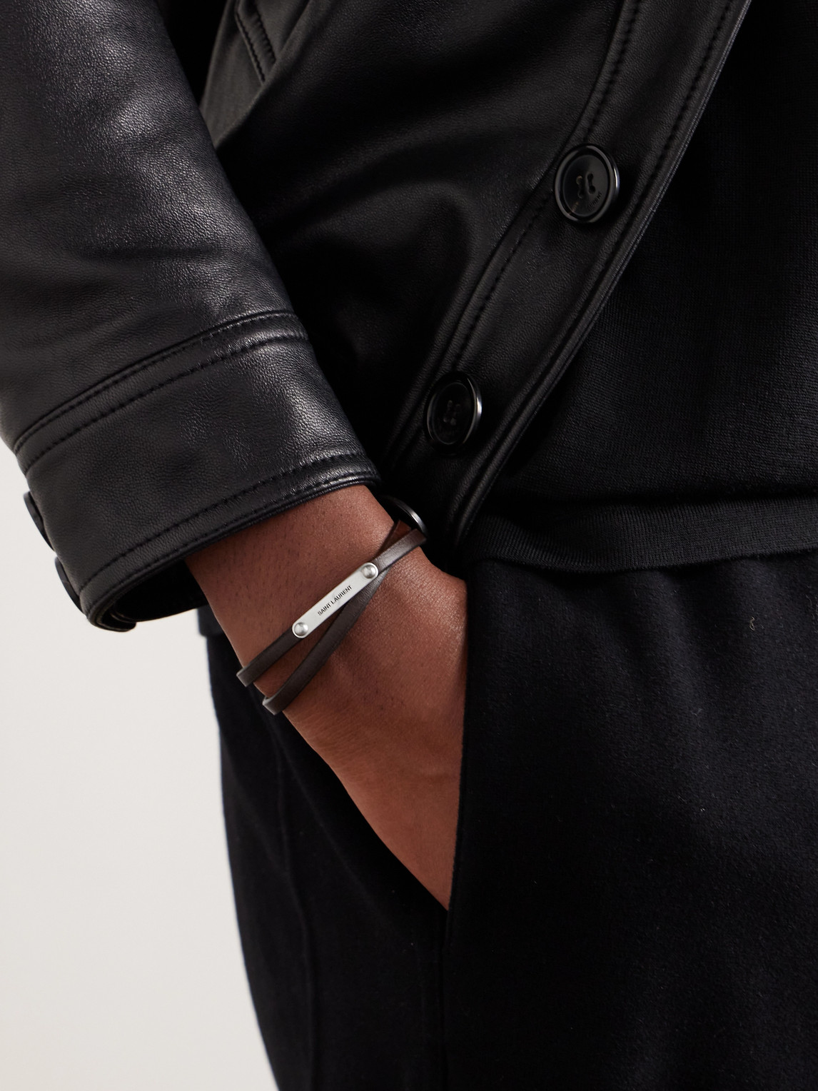 Shop Saint Laurent Cassandre Silver-tone And Leather Bracelet In Black