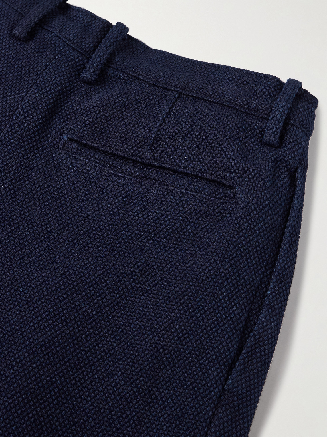 Shop Blue Blue Japan Tapered Pleated Indigo-dyed Sashiko Cotton Trousers In Blue