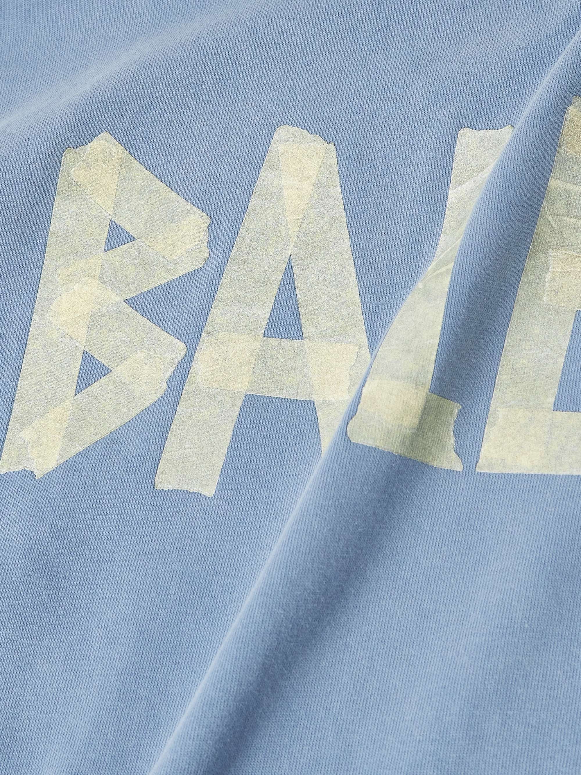 BALENCIAGA 오버사이즈 디스트레스 로고 프린트 코튼 저지 티셔츠