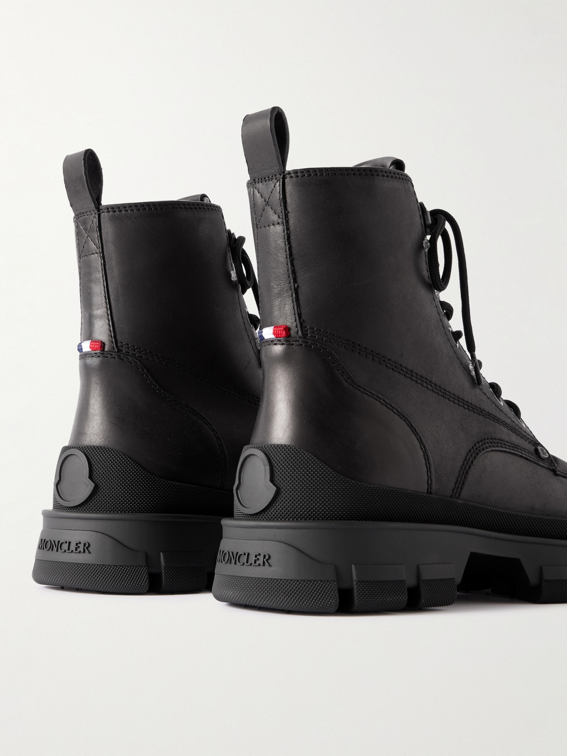 Moncler Hevea City Leather Boots In Black