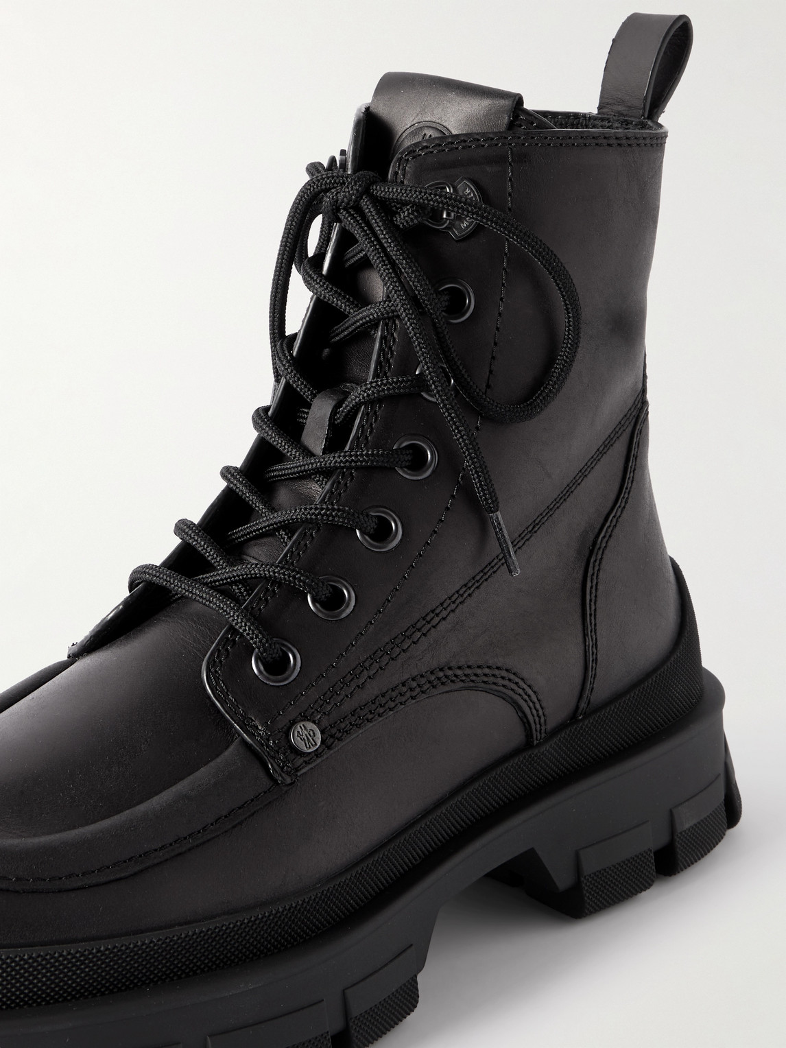 Moncler Hevea City Leather Boots In Black