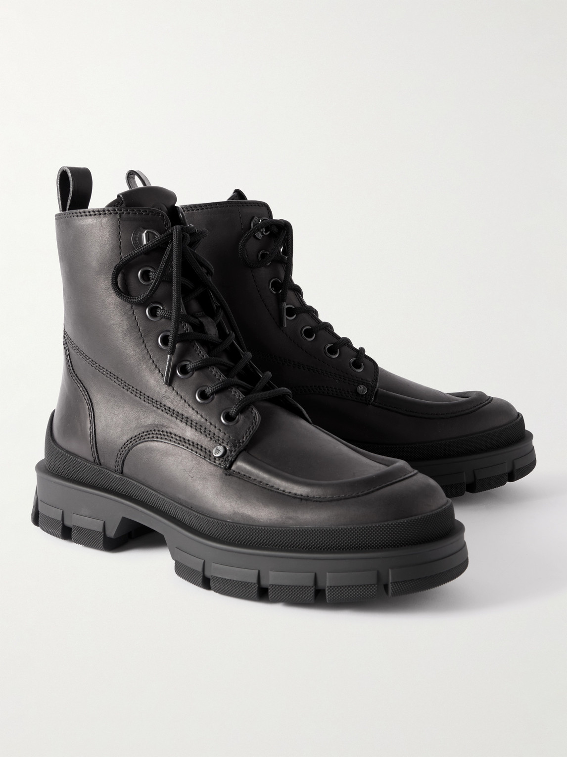 Moncler Hevea City Leather Boots In Black