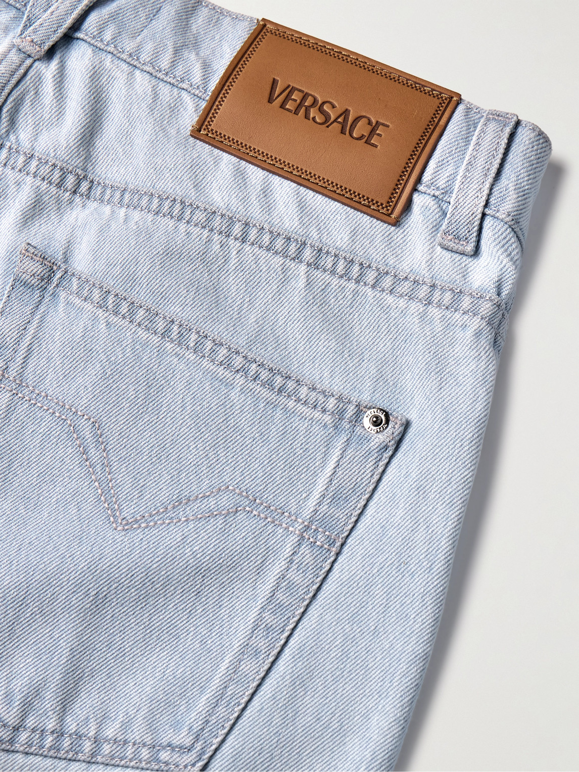 Shop Versace Bootcut Jeans In Blue
