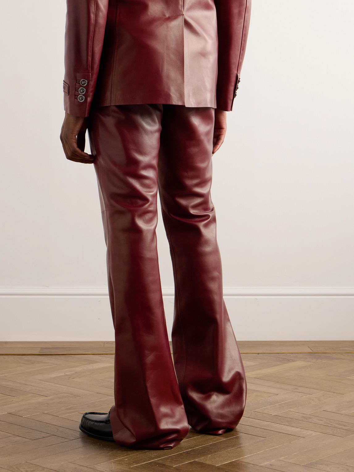 Shop Versace Slim-fit Flared Leather Trousers In Red
