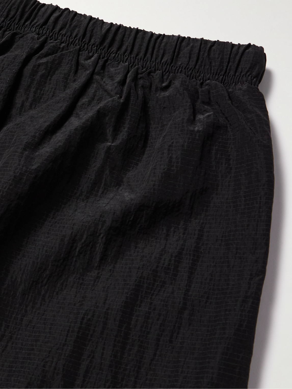 Essentials Wide-leg Logo-appliquéd Crinkled Nylon-ripstop Drawstring Shorts In Black