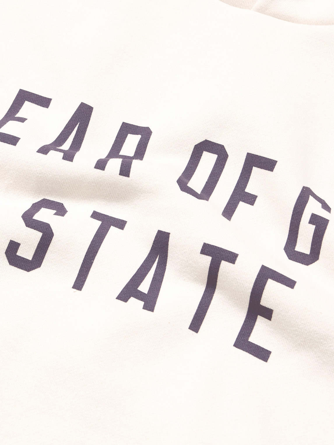ESSENTIALS OVERSIZED LOGO-PRINT COTTON-BLEND JERSEY HOODIE 