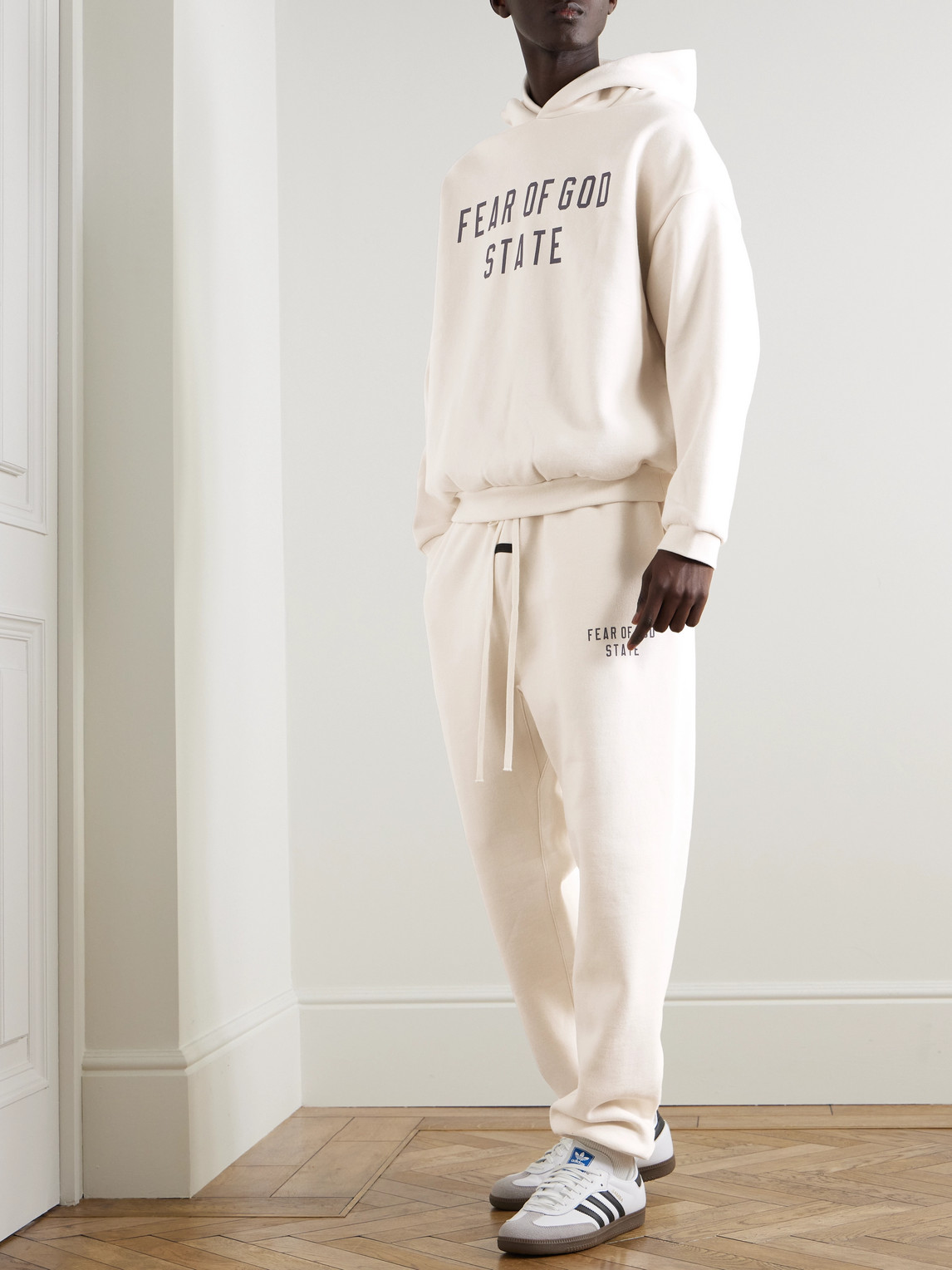 ESSENTIALS OVERSIZED LOGO-PRINT COTTON-BLEND JERSEY HOODIE 