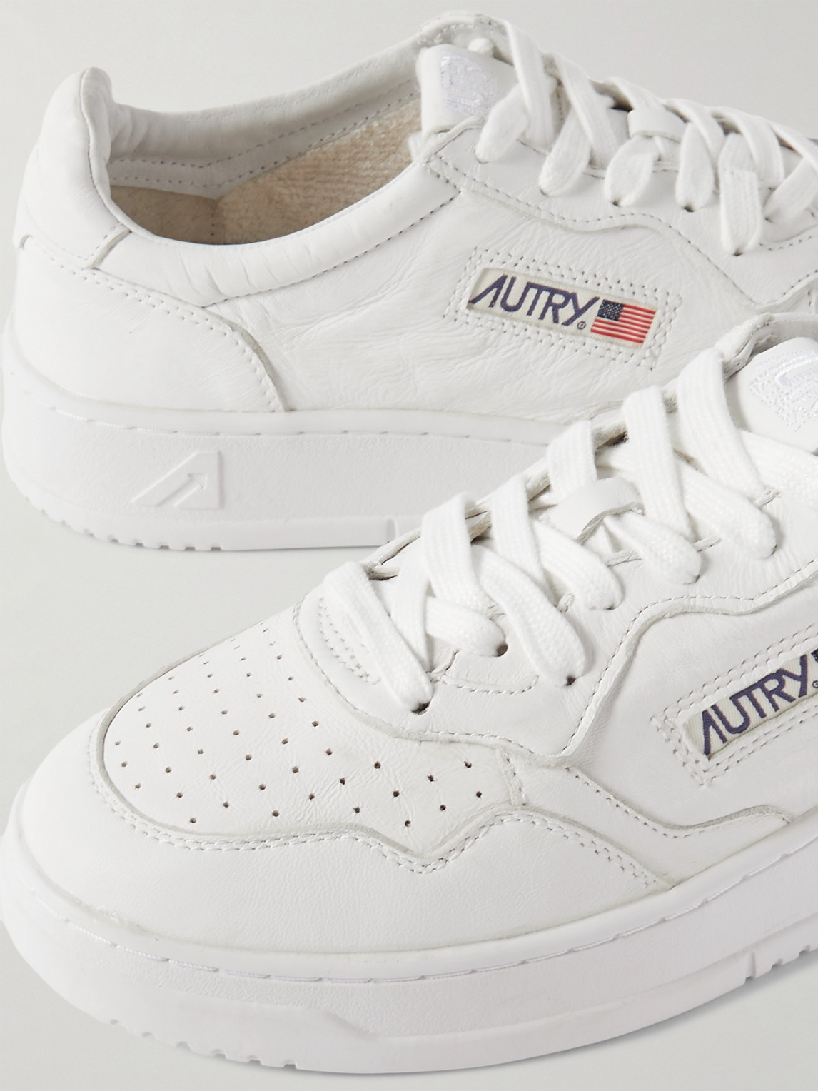 Autry Low-top Sneakers With Smooth Leather Upper And Perforated Detailing In White