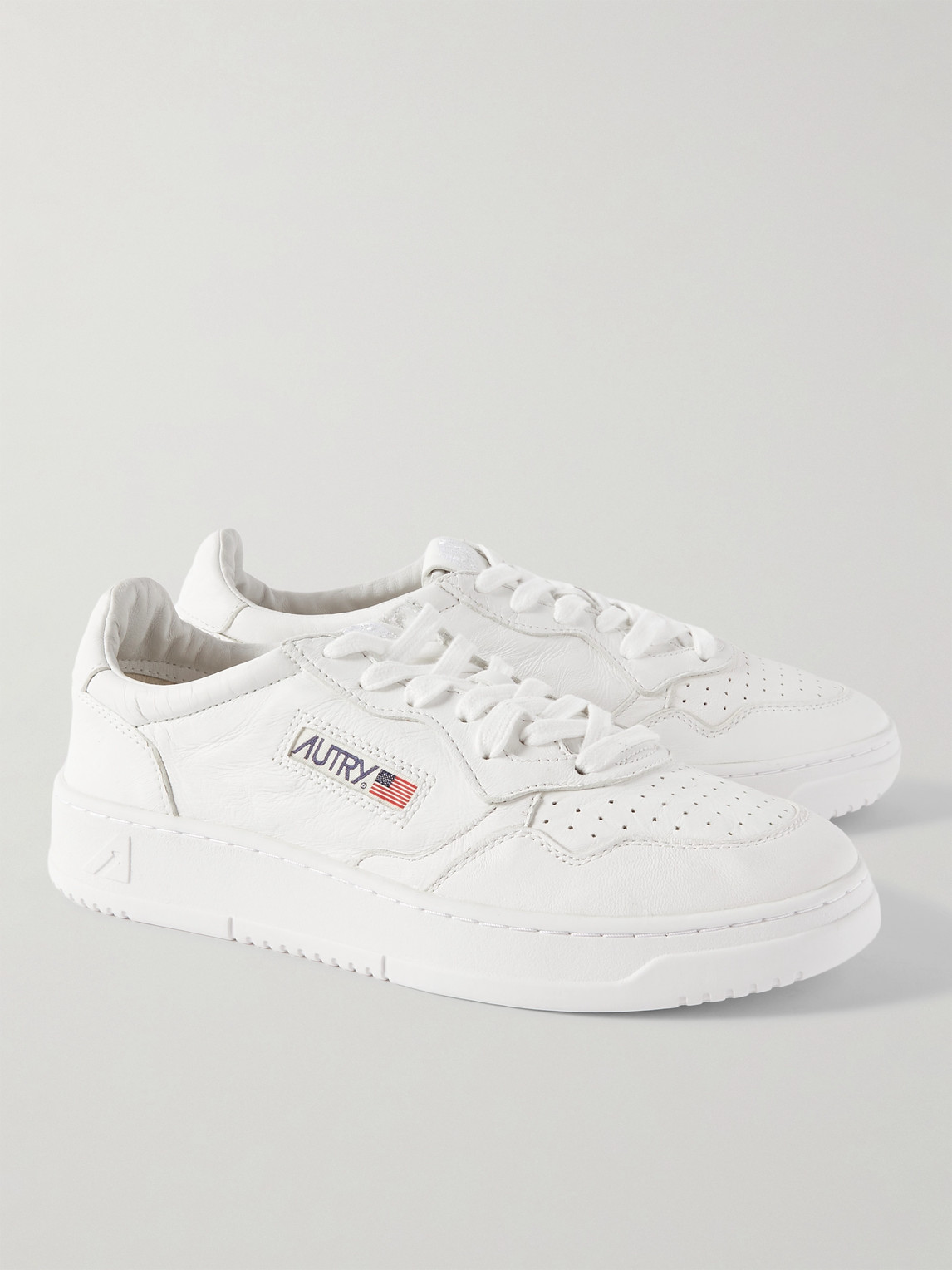 Autry Low-top Sneakers With Smooth Leather Upper And Perforated Detailing In White