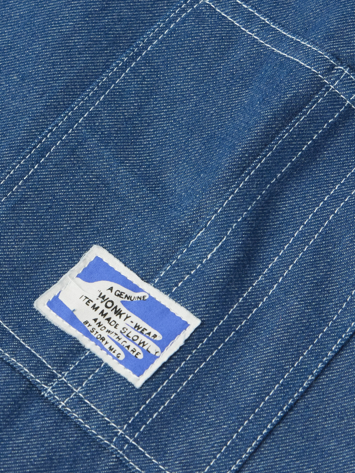 STORY MFG. RAILROAD LOGO-APPLIQUÉD ORGANIC DENIM JACKET