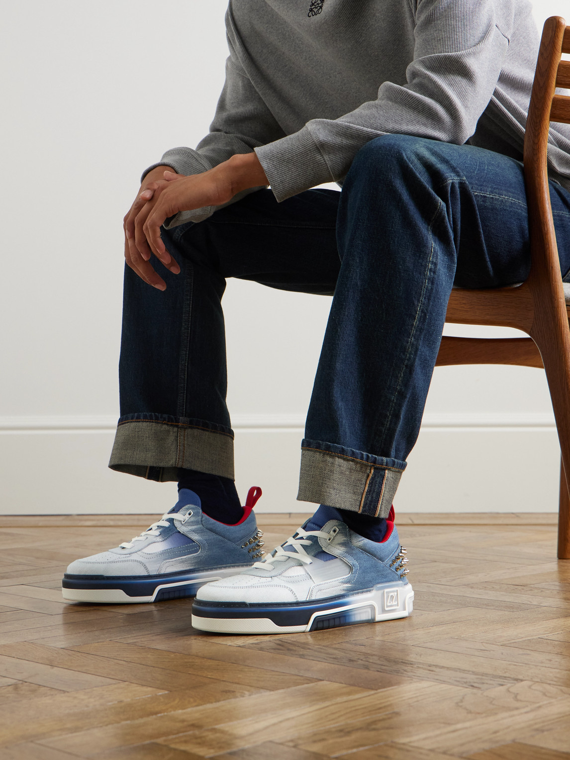 CHRISTIAN LOUBOUTIN ASTROLOUBI SPIKED DÉGRADÉ DENIM AND MESH SNEAKERS