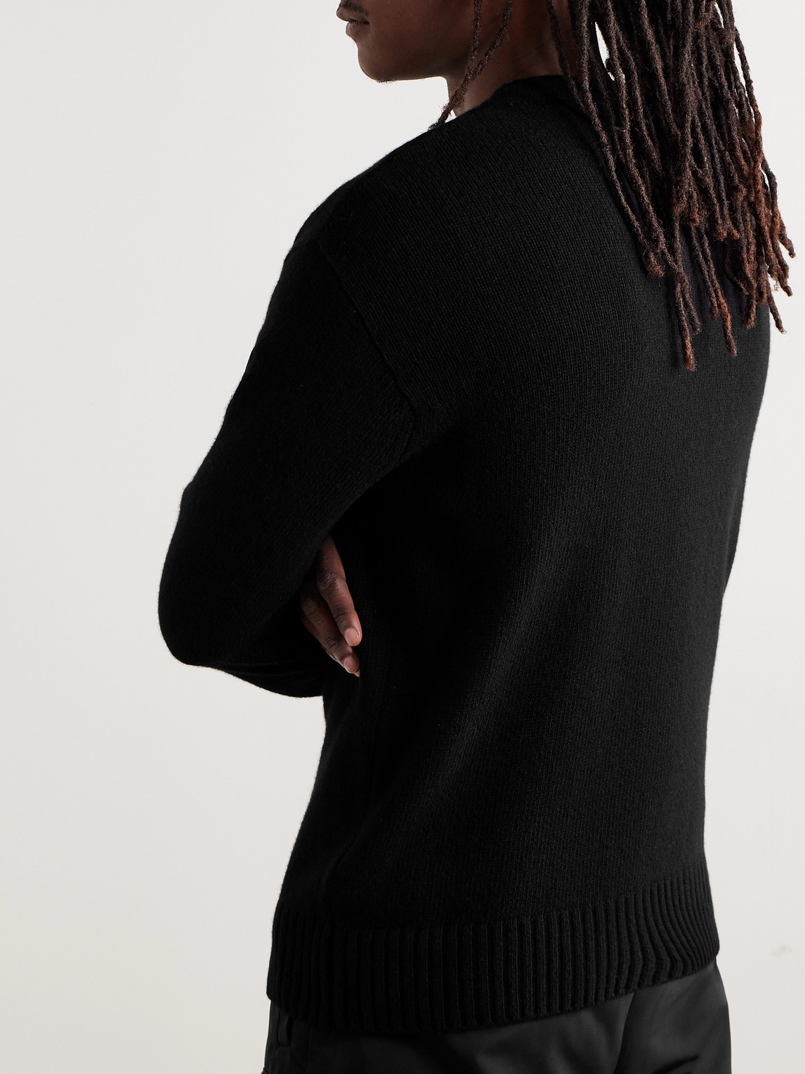 Shop Moncler Logo-appliquéd Virgin Wool And Cashmere-blend Sweater In Black