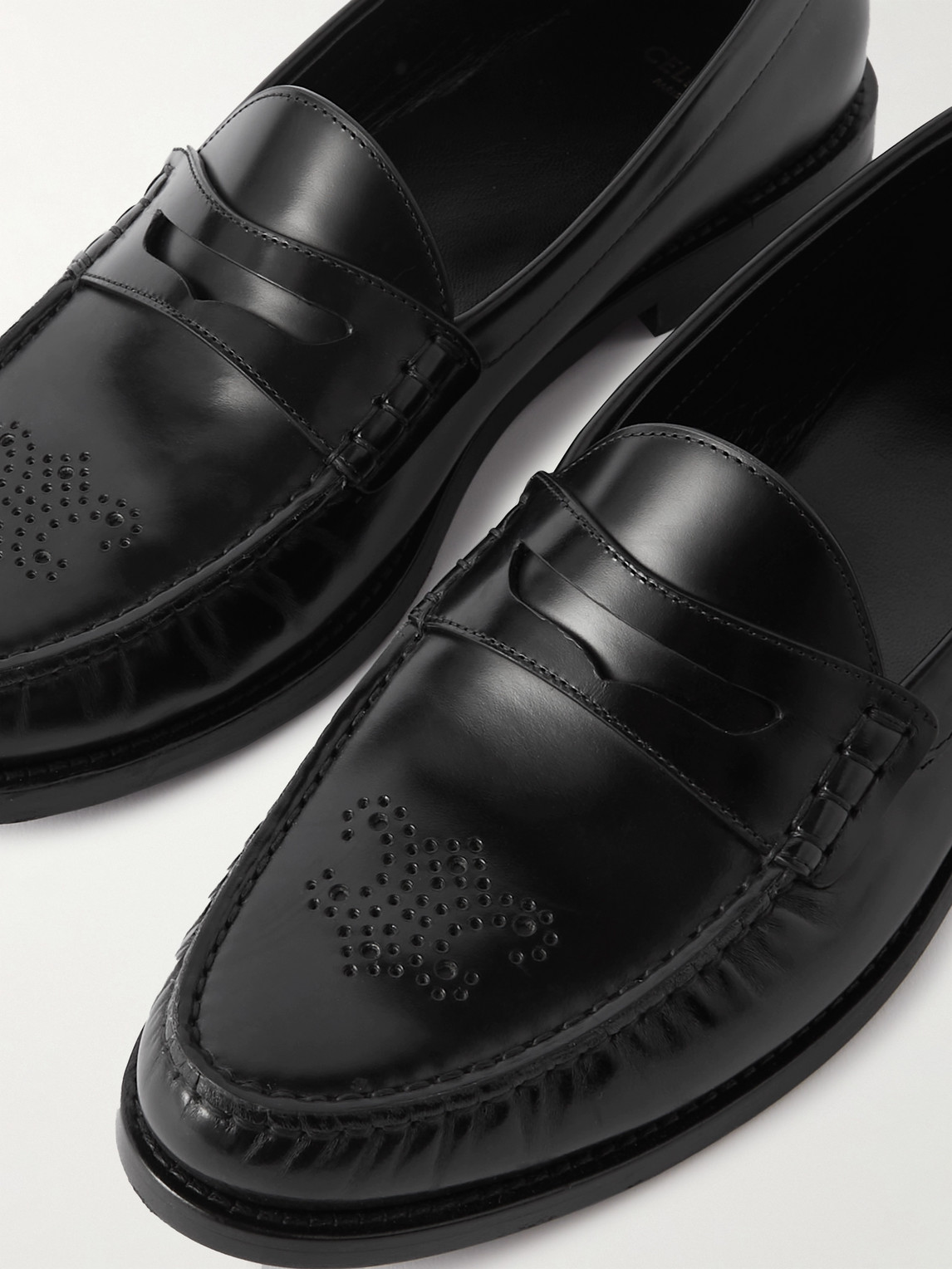 Celine Vivienne Perforated Glossed-leather Penny Loafers In Black