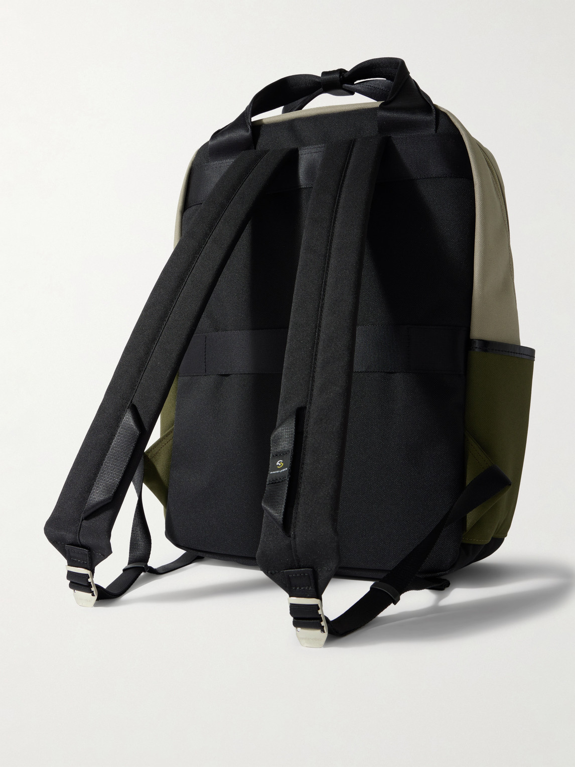 Master-piece Defend Leather-trimmed Coated-canvas Backpack In Green