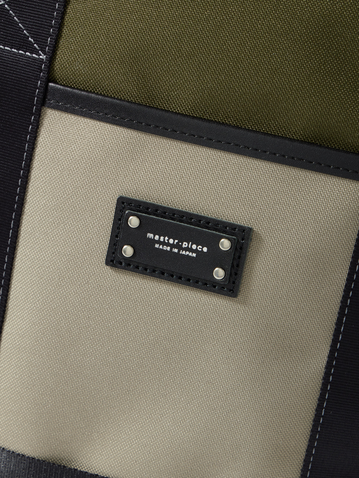 Master-piece Defend Leather-trimmed Coated-canvas Backpack In Green