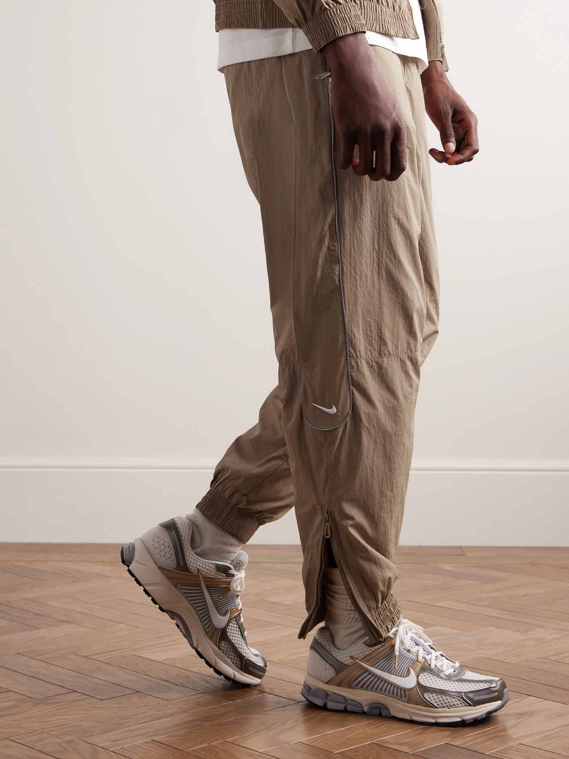 nike track pants beige