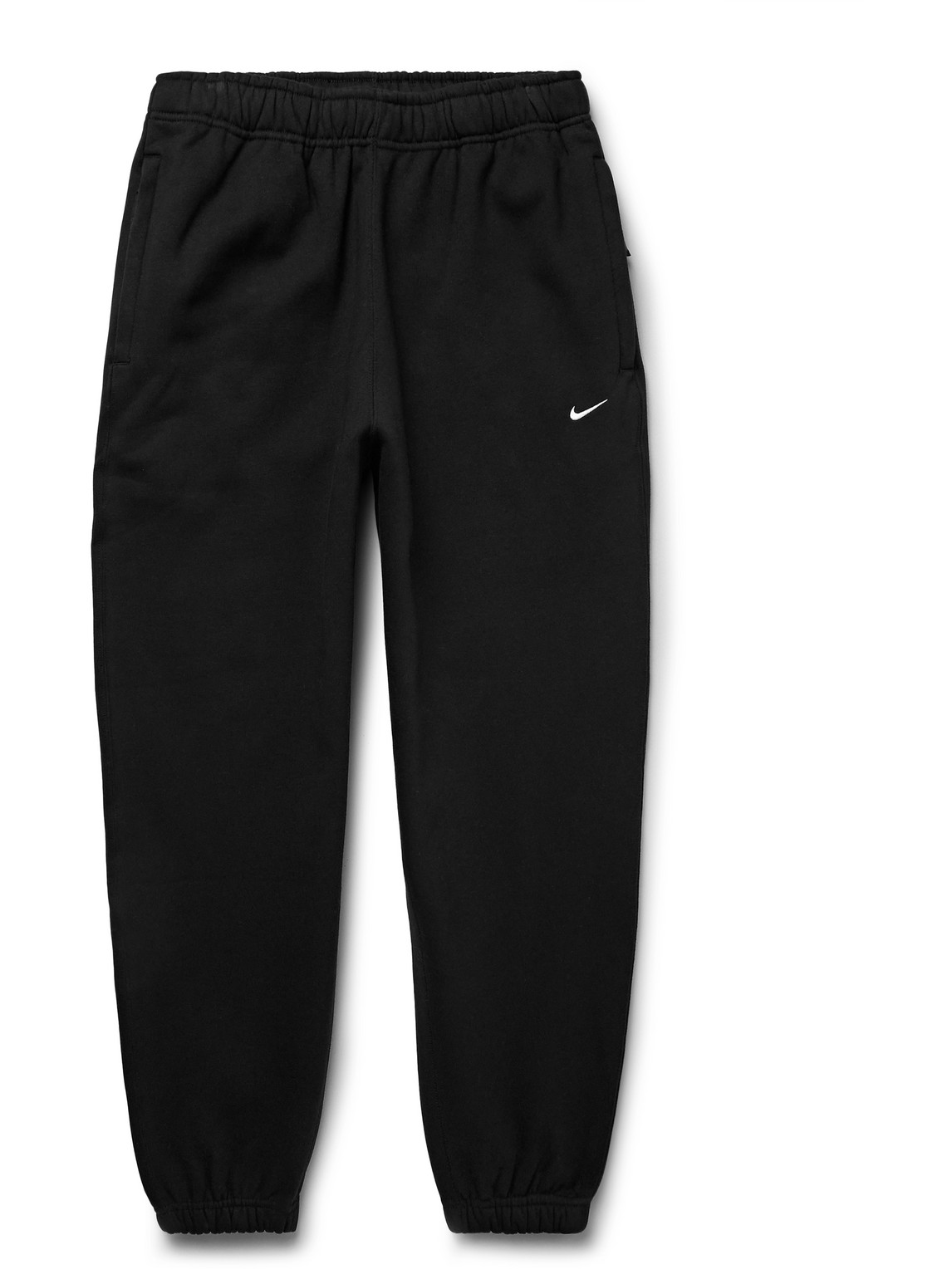 Shop Nike Solo Swoosh Tapered Logo-embroidered Cotton-blend Jersey Sweatpants In Black