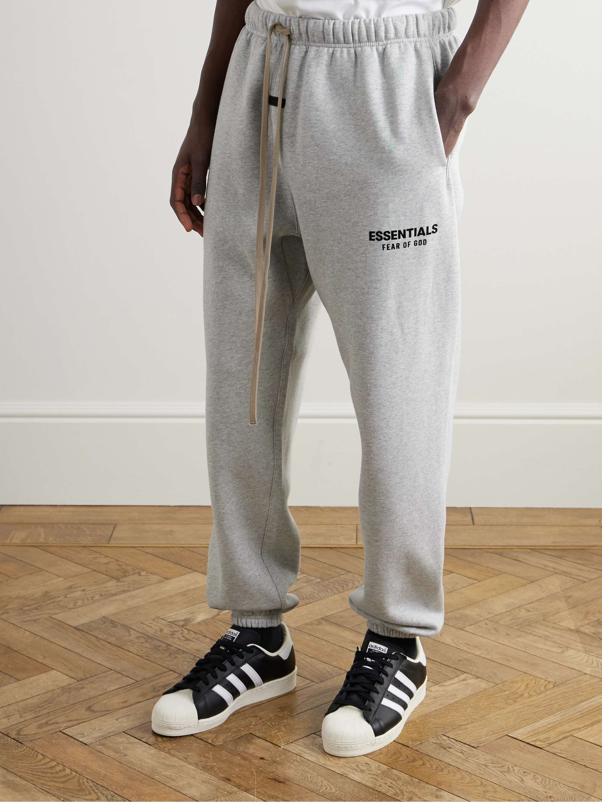 FEAR OF GOD ESSENTIALS Tapered Logo Appliqued Cotton Blend Jersey Sweatpants for Men MR PORTER