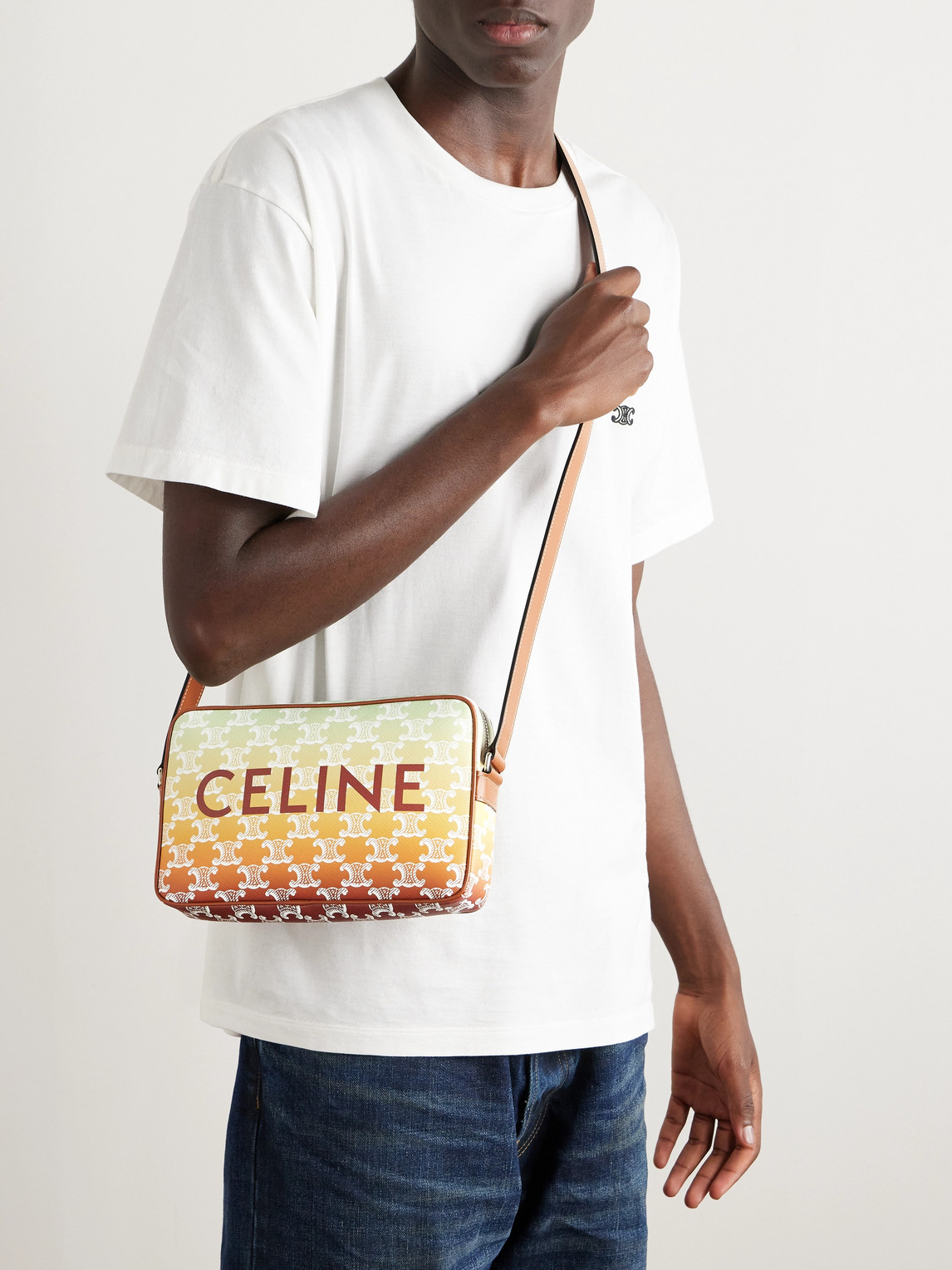 Celine Triomphe Leather-trimmed Logo-print Coated-canvas Messenger Bag In Yellow