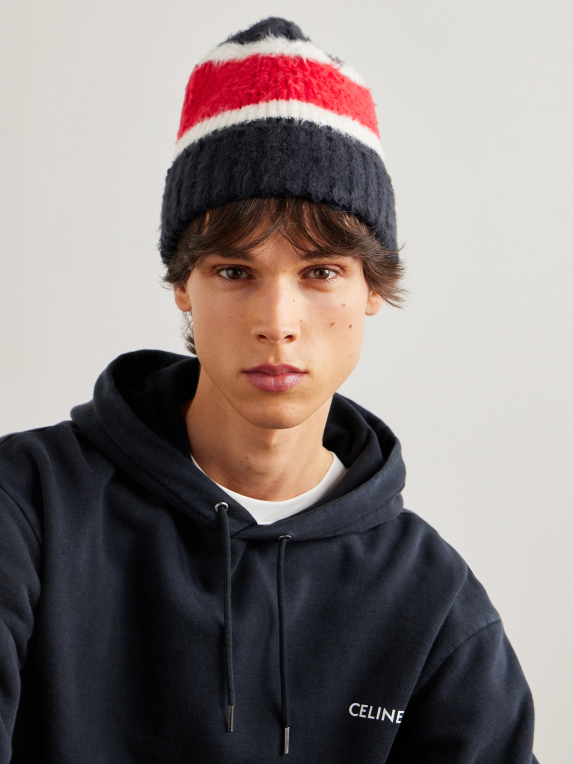 Celine Striped Ribbed Brushed-cotton Beanie In Black
