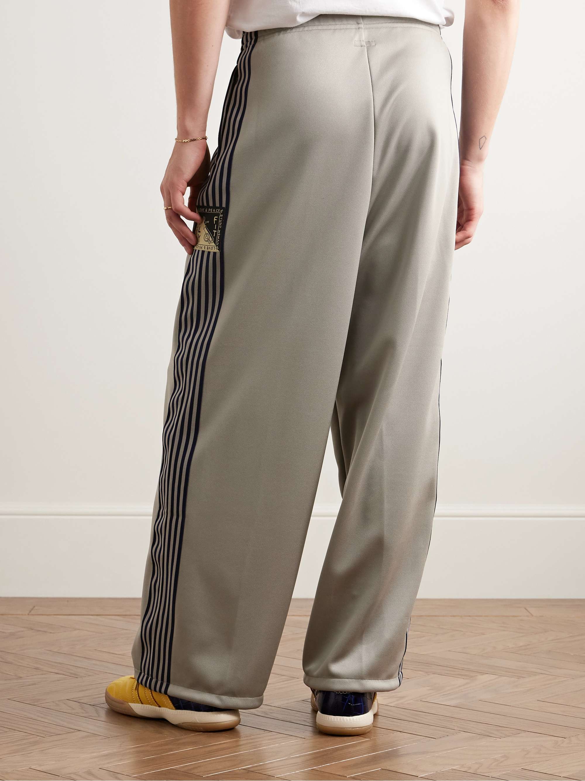 KAPITAL Straight-Leg Pleated Appliquéd Striped Tech-Jersey