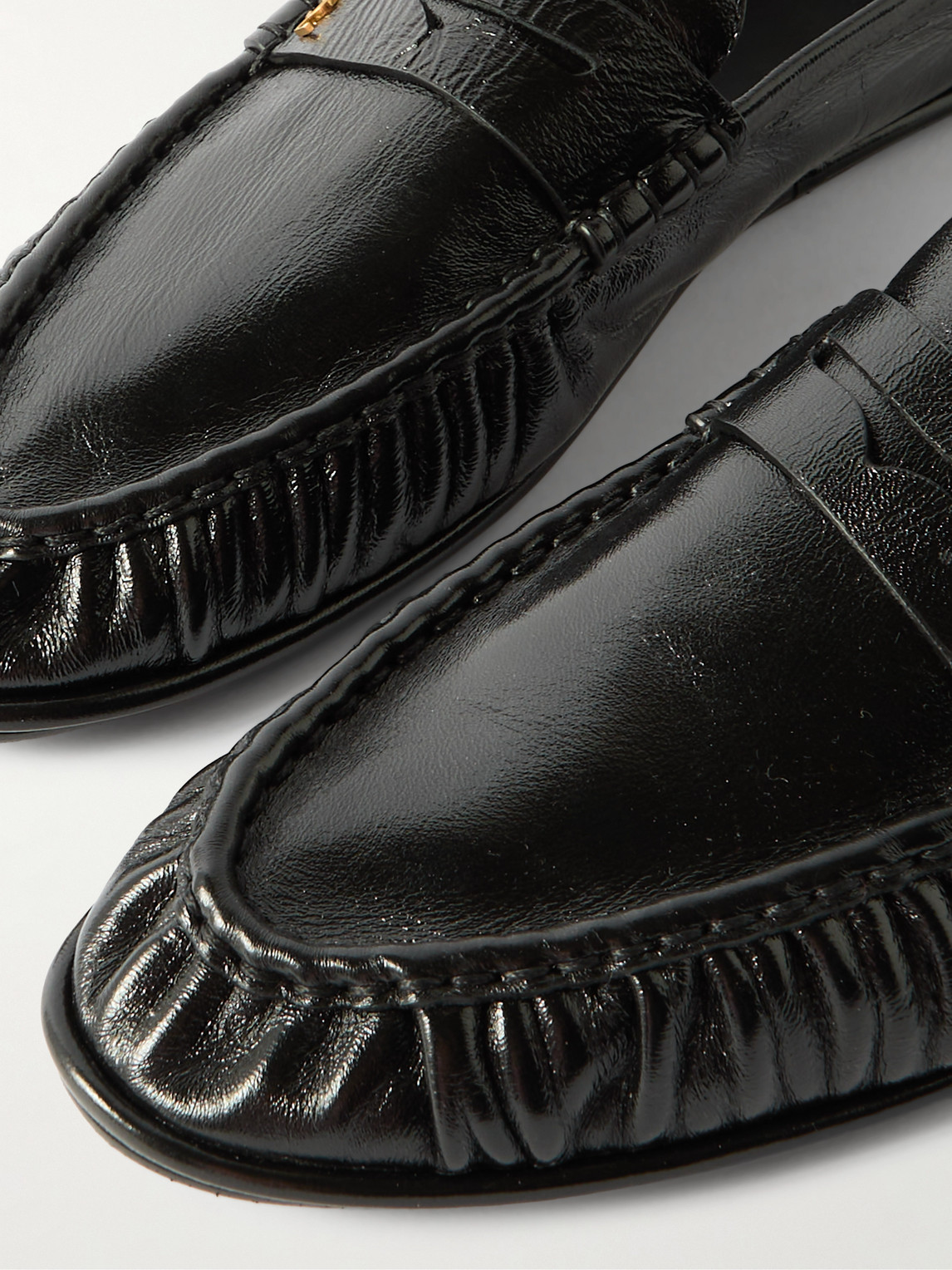 Saint Laurent Logo-embellished Collapsible-heel Leather Penny Loafers In Black