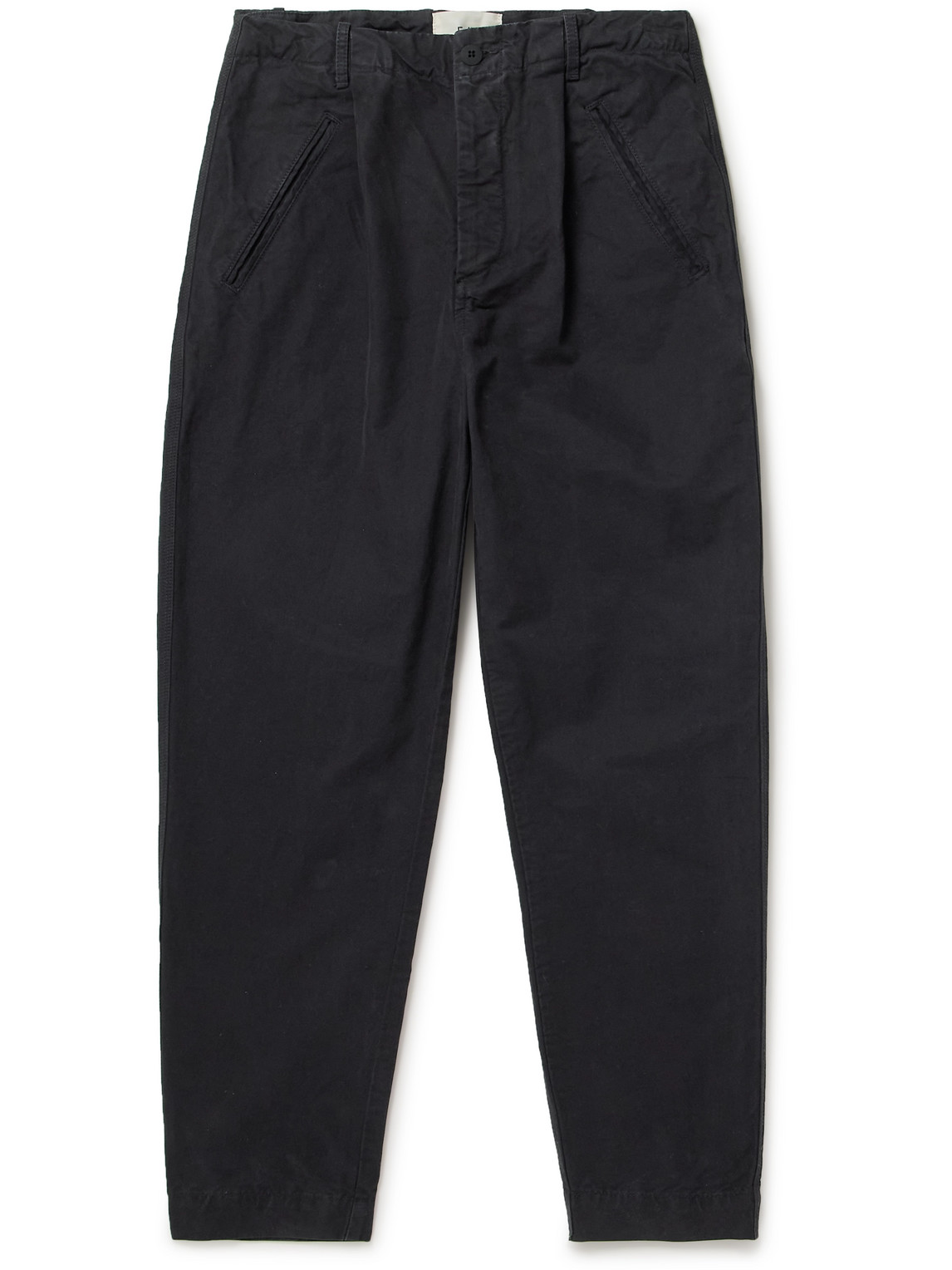 Folk Assembly Tapered Pleated Cotton-canvas Trousers In Black