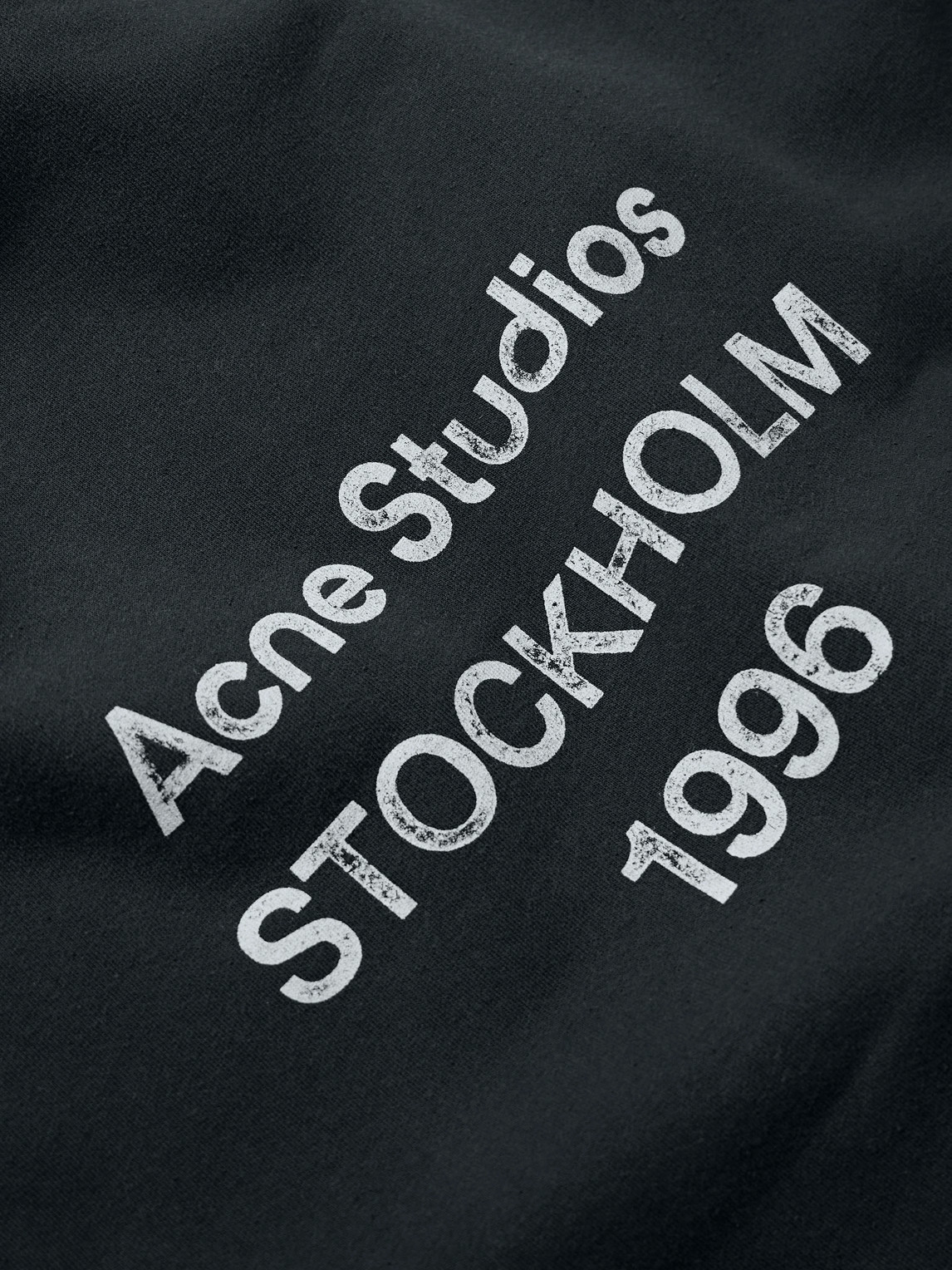 Acne Studios Franziska Garment-dyed Distressed Logo-print Cotton-blend Jersey Hoodie In Black