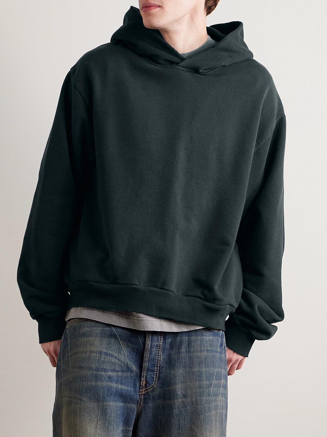 Acne Studios Franziska Garment-dyed Distressed Logo-print Cotton-blend Jersey Hoodie In Black