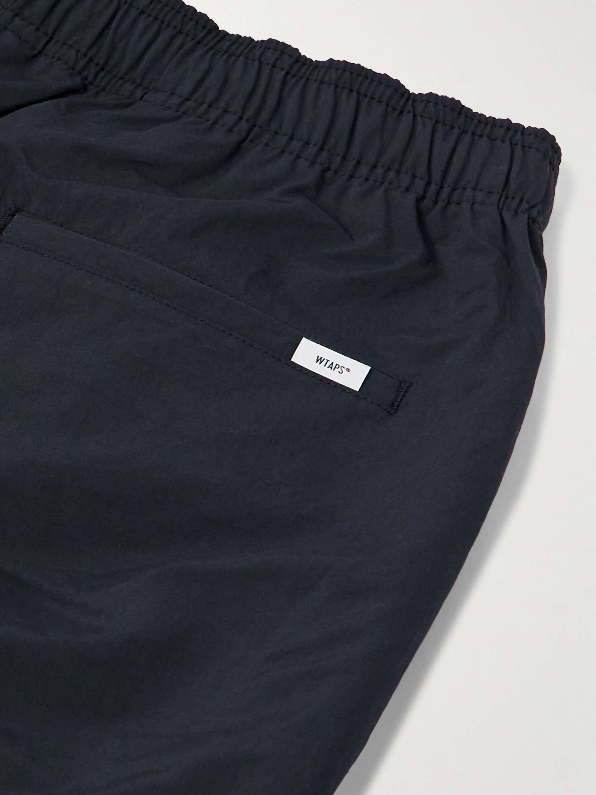 WTAPS® Straight-Leg Logo-Embroidered Nylon Trousers for Men