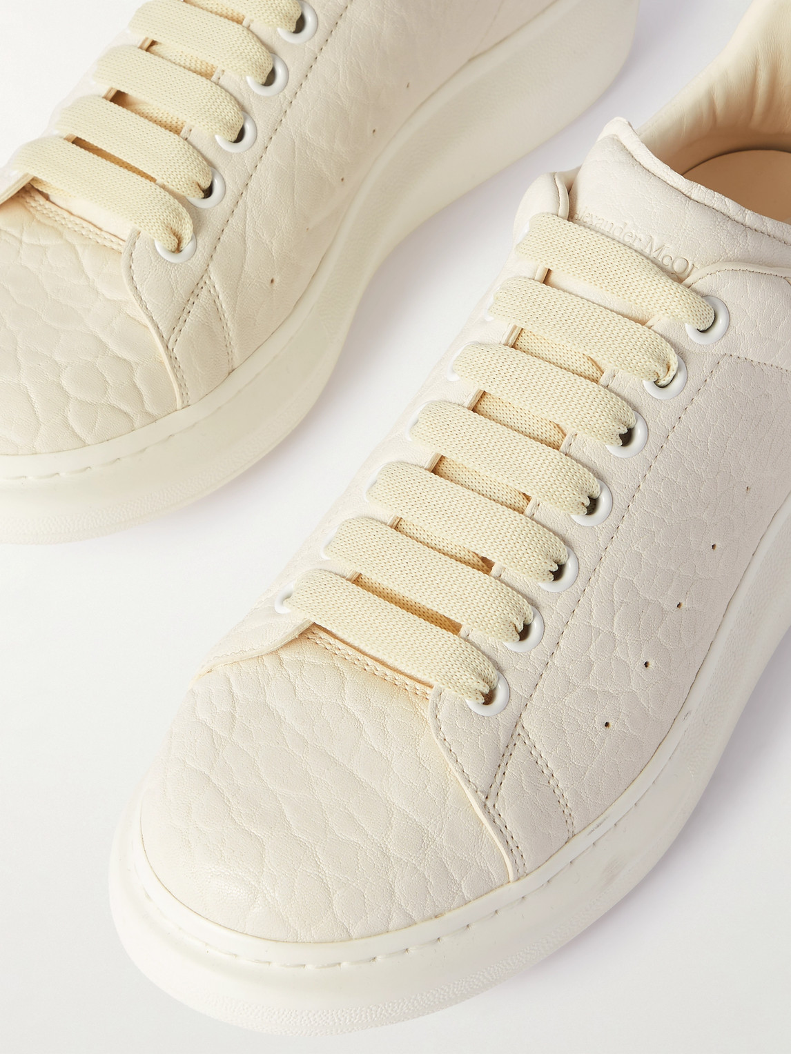 Alexander Mcqueen Exaggerated-sole Textured-leather Sneakers In Black