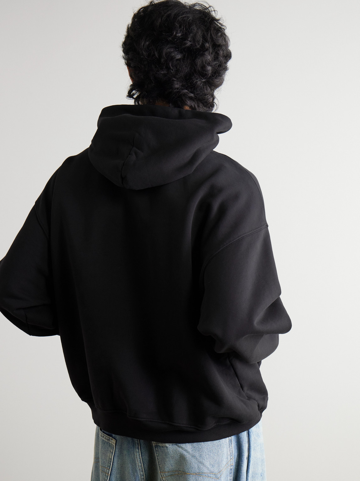 Shop Balenciaga Oversized Logo-print Cotton-jersey Hoodie In Black