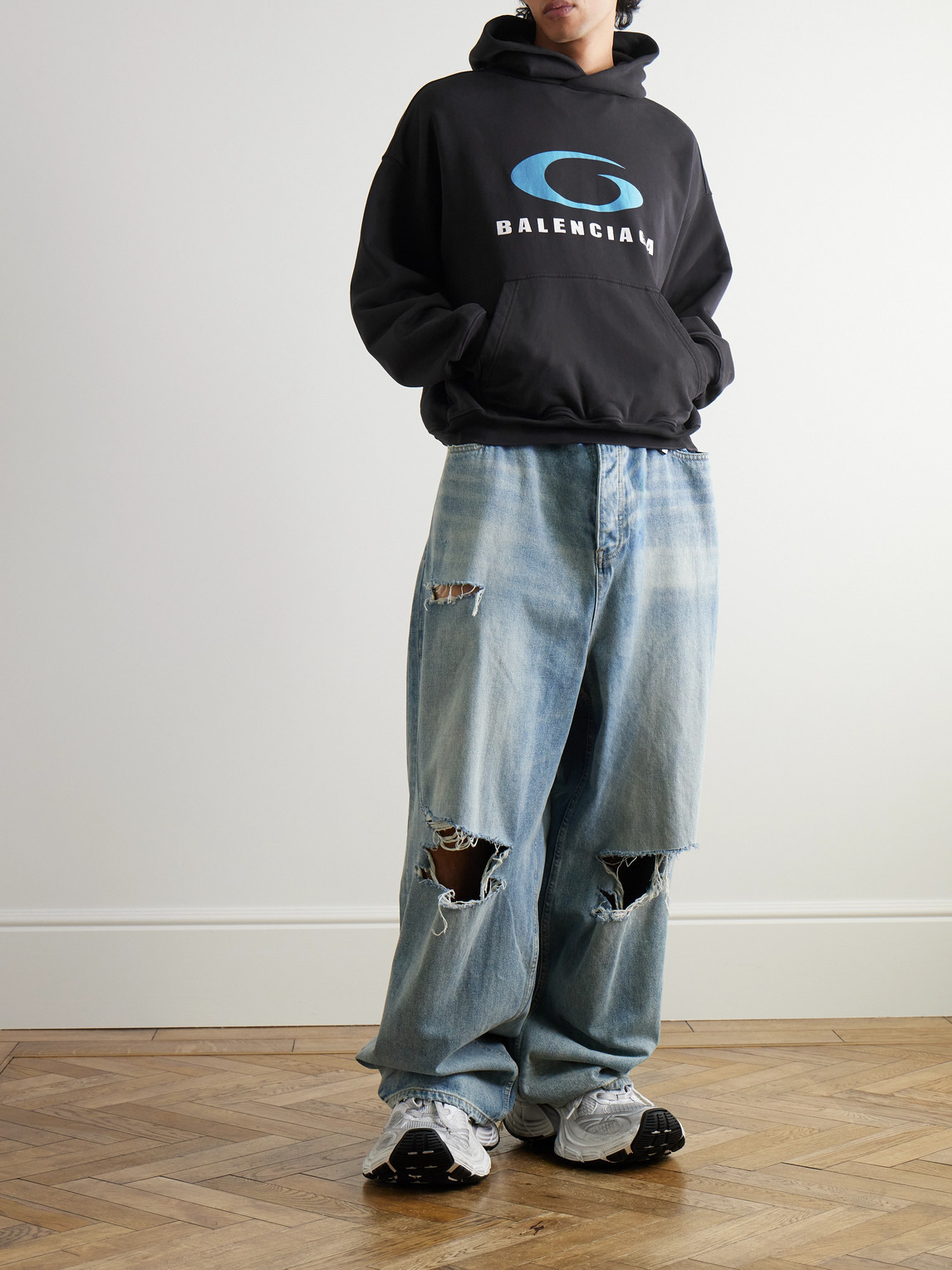 Shop Balenciaga Oversized Logo-print Cotton-jersey Hoodie In Black