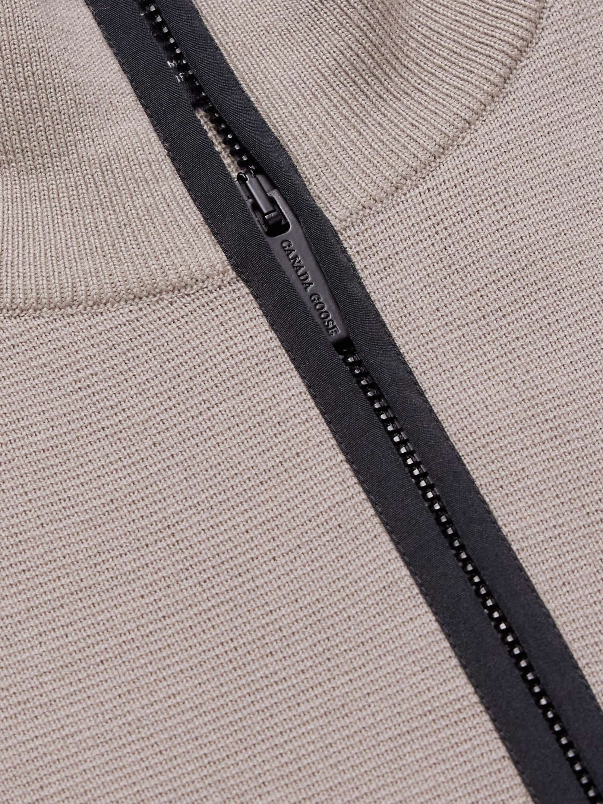 CANADA GOOSE كنزة Stormont بسحّاب نصفي وقصّة ضيّقة من صوف المارينو بحاشية من نسيج CORDURA