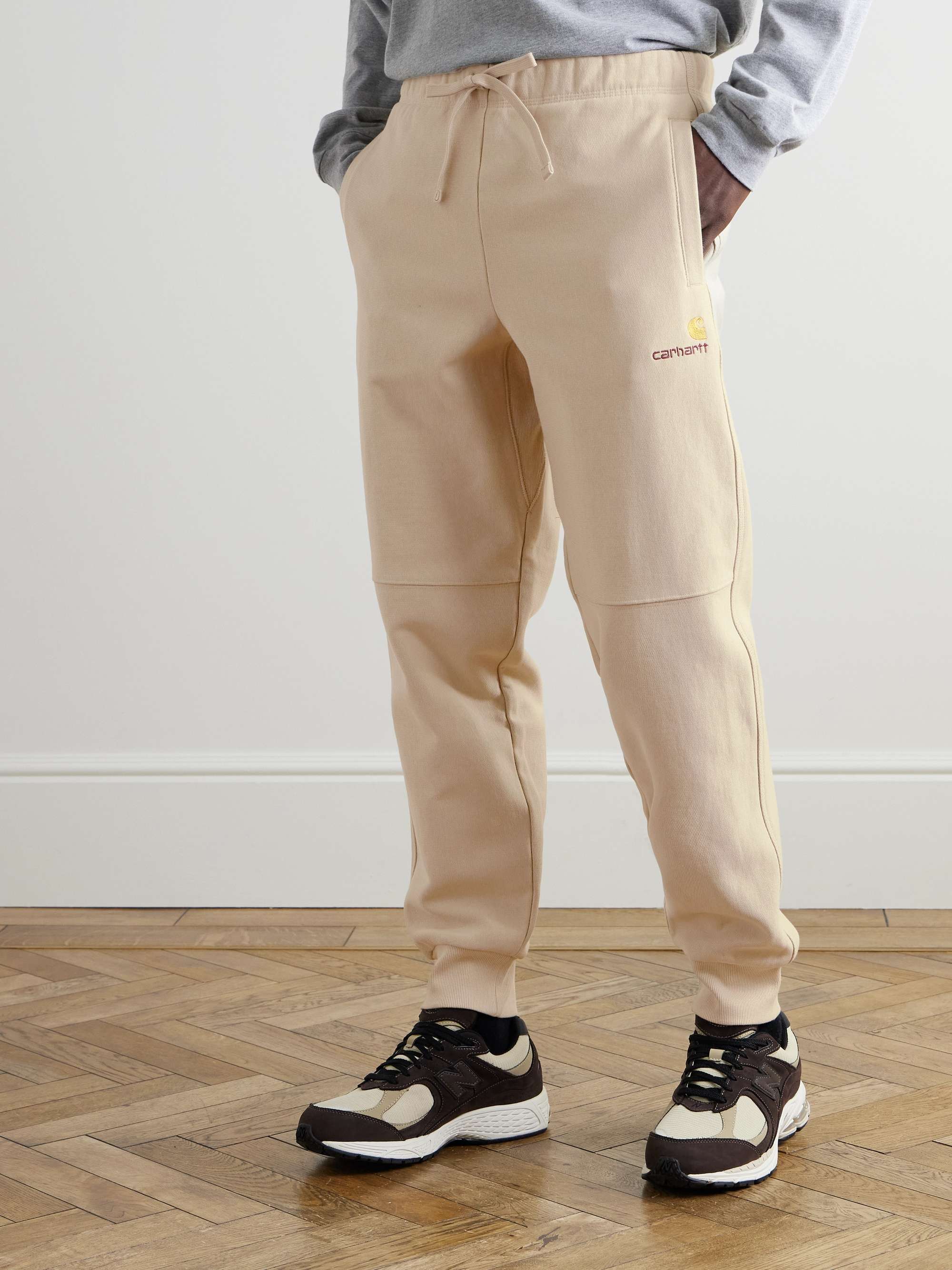 CARHARTT WIP 아메리칸 스크립트 테이퍼드 코튼 혼방 저지 스웨트팬츠